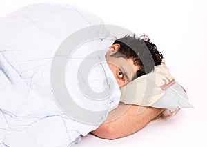 Young man annoyed by the noise