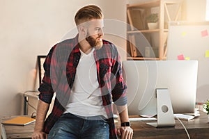 Young man architect working in the office ocuupation