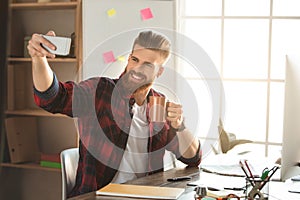 Young man architect working in the office ocuupation