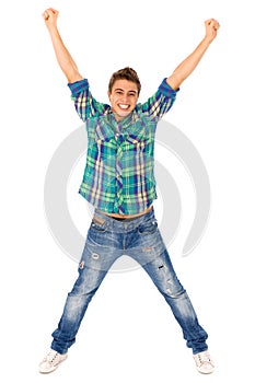 Young man with arms raised