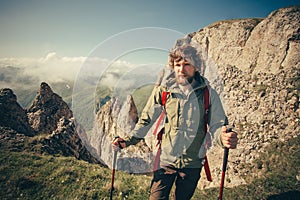 Young Man with backpack hiking outdoor Travel