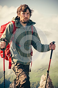Young Man with backpack hiking outdoor Travel
