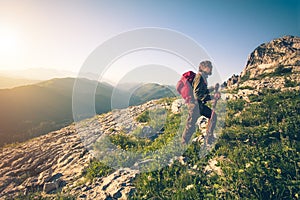 Young Man with backpack mountaineering outdoor