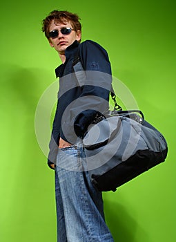 Young man with the bag, traveler