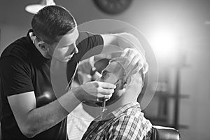 Young man at the barbershop