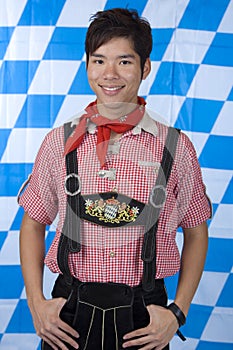 Young man with Bavarian Oktoberfest Lederhose photo