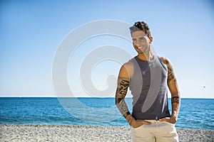 Young Man at Beach in Sunny Summer Day