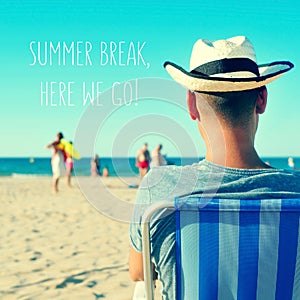 A young man on the beach and the text summer break, here we go