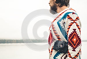 Young Man bearded with retro photo camera Fashion Travel Lifestyle