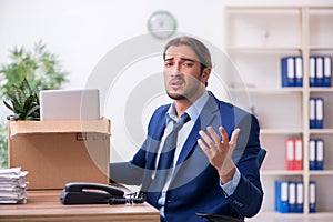 Young man being fired from his work