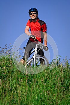 Young man with bicycle