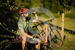 Young man biking on a mountain bike