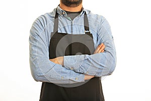 Young man with black apron