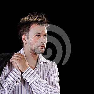 young man on black background