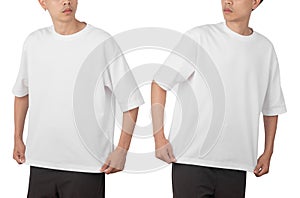 Young man in blank oversize t-shirt mockup front and back used as design template