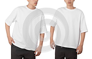 Young man in blank oversize t-shirt mockup front and back used as design template, isolated on white background