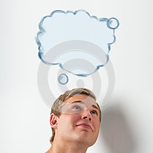 Young man with a blank speech bubble over his head