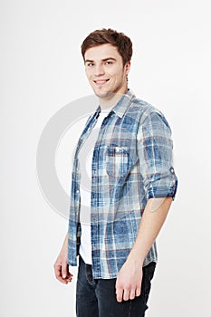 Young man in blank summer blank t shirt isolated on white background. Unshaven confident serious male enterpreneur. Copy space.