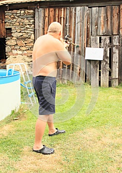 Young man with blowpipe photo