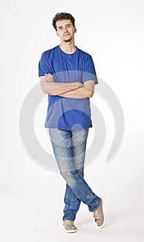 Young man with blue portrait in studio