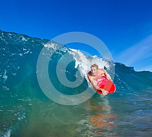 Young man body boarding