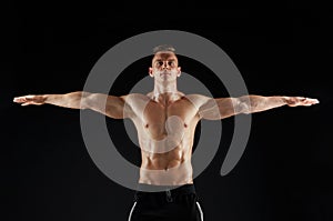 Young man or bodybuilder with bare torso