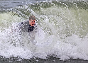 Young Man Bodysurfing