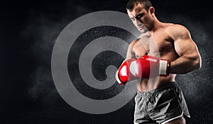 Young man boxer concentrating before decisive fight