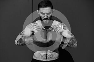 Young man boxing workout in an old building