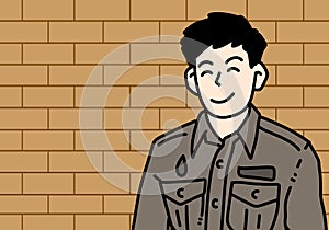 young man in a brick wall