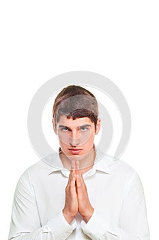 Young man bright-eyed blonde praying