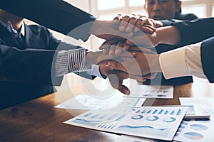 Young man business people shaking hands after brief job for contract signing in modern office with vintage picture style,