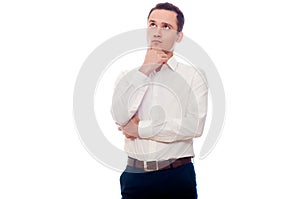 Young man in business suit thinking. Businessman making decision