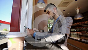 Young man businessman using tablet computer