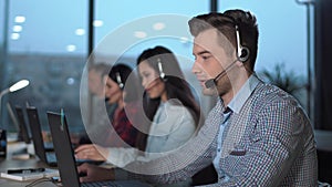 Young man in call center