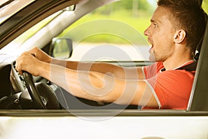 Young man in car