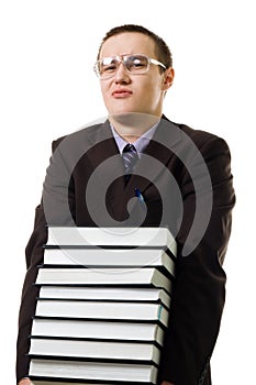 Young man carry pile of books