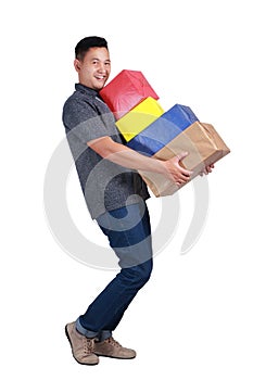 Young Man Carying Boxes of Gift