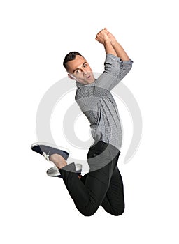 Young man in casual clothes jumping