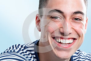 Young man with charming smile.