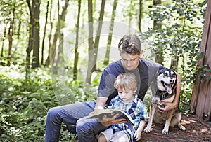 Young man and child reading