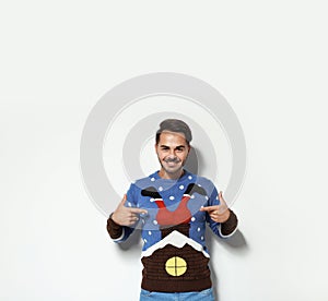 Young man in Christmas sweater