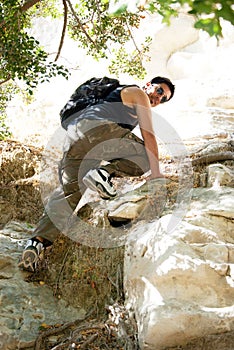 Young man climbing