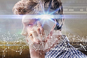 young man communicating via futuristic phone, virtual network hologram b