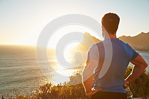 Young man contemplating after jogging