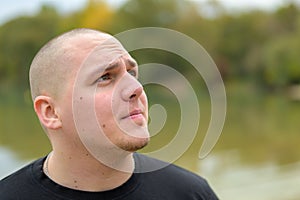 Young man with a contemplative expression