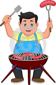 Young man cooking meat at BBQ party