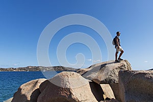 Young man at the Costa Smeralda in Sardinia, Italy