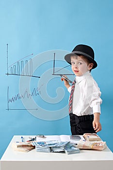 Young man, counting money and taking notes