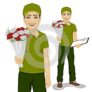 Young man courier holding bouquet of flowers